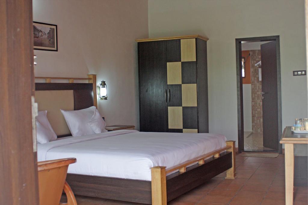Eka Resort Hassan Quarto foto
